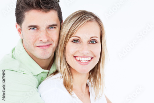 Adorable couple smiling at the camera