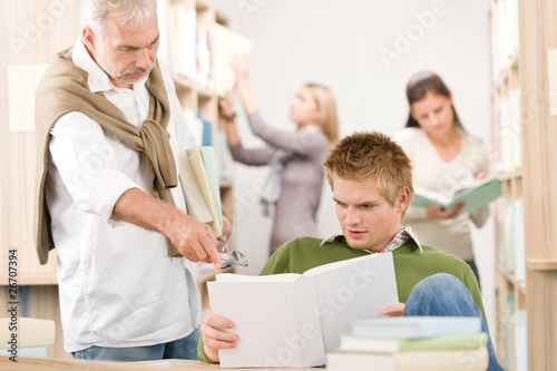 Library - student with mature professor © CandyBox Images