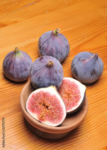 slice fig on wood background