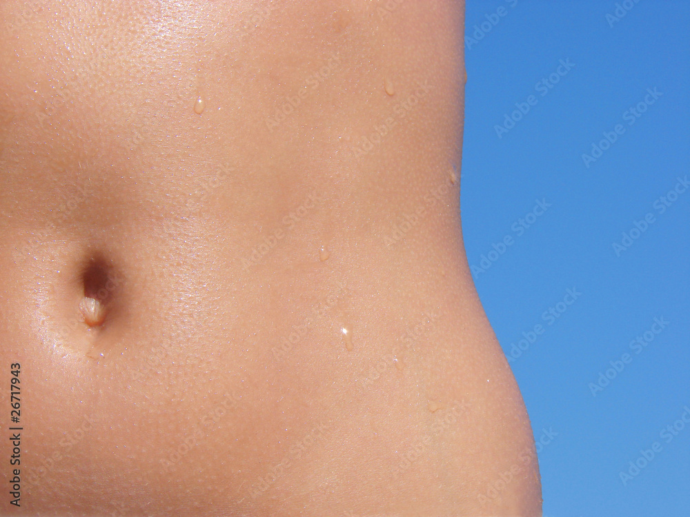 female torso with water drops female torso with water drops