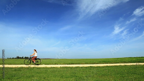 Woman at outdoor riding a bycicle