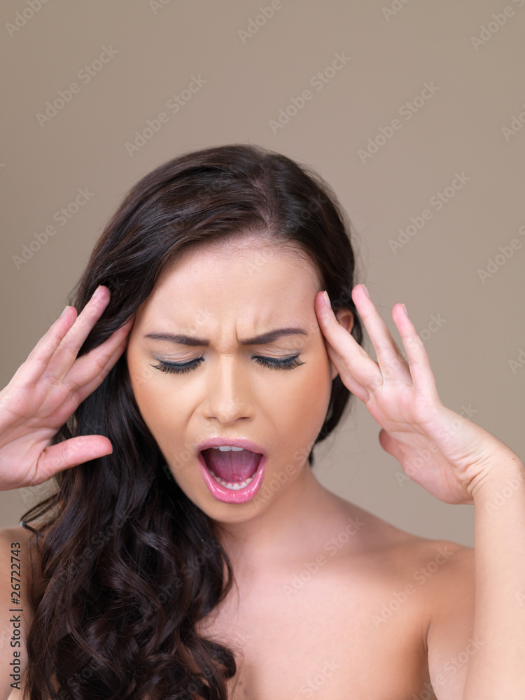 Fototapeta premium Portrait of beautiful woman she has a headache