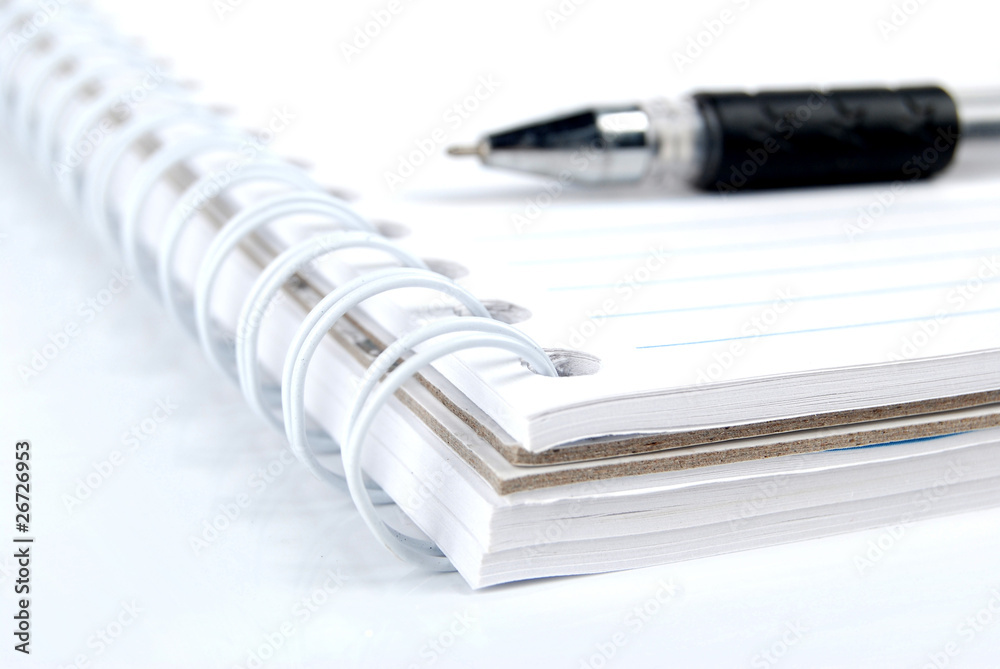 Pen and notebook on white background Pen and notebook on white background