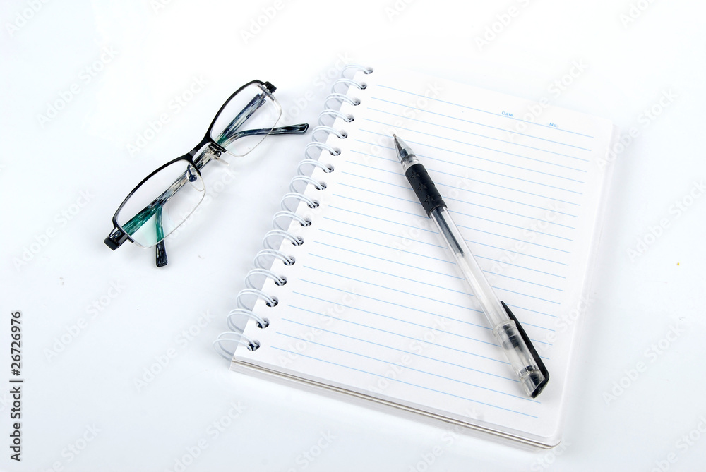 Pen,notebook and glasses on white background Pen,notebook and glasses on white background