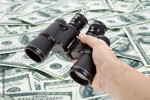 Binoculars and dollar