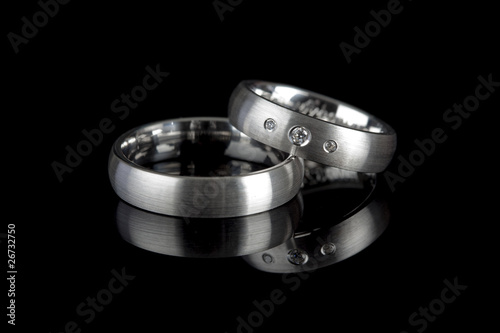 wedding rings on black background