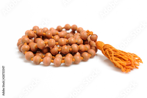 Traditional indian rosary for meditation - mala . isolated on wh