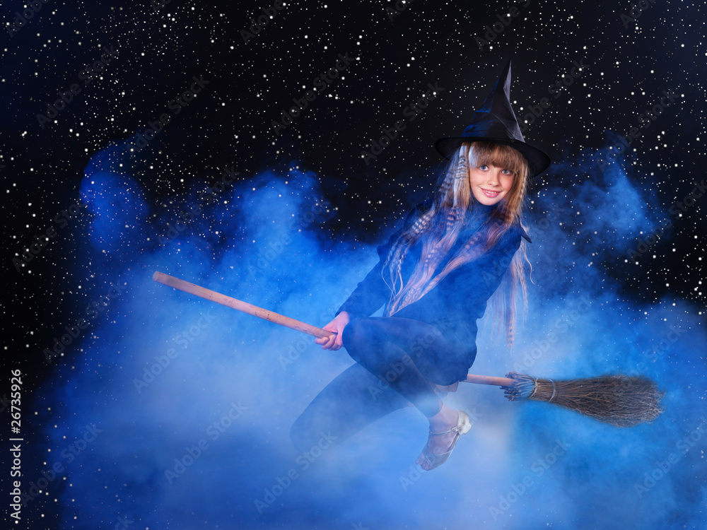 Witch flying on broomstick.