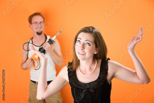 Frustrated woman and incompetent handyman