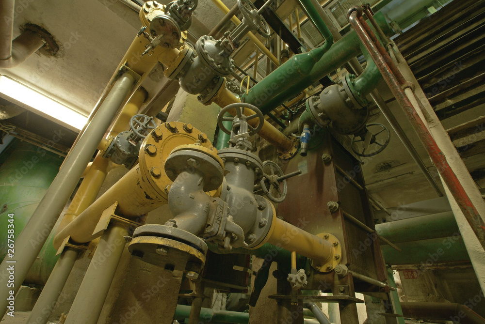 Equipment, cables and piping as found inside of a modern industr Equipment, cables and piping as found inside of a modern industr