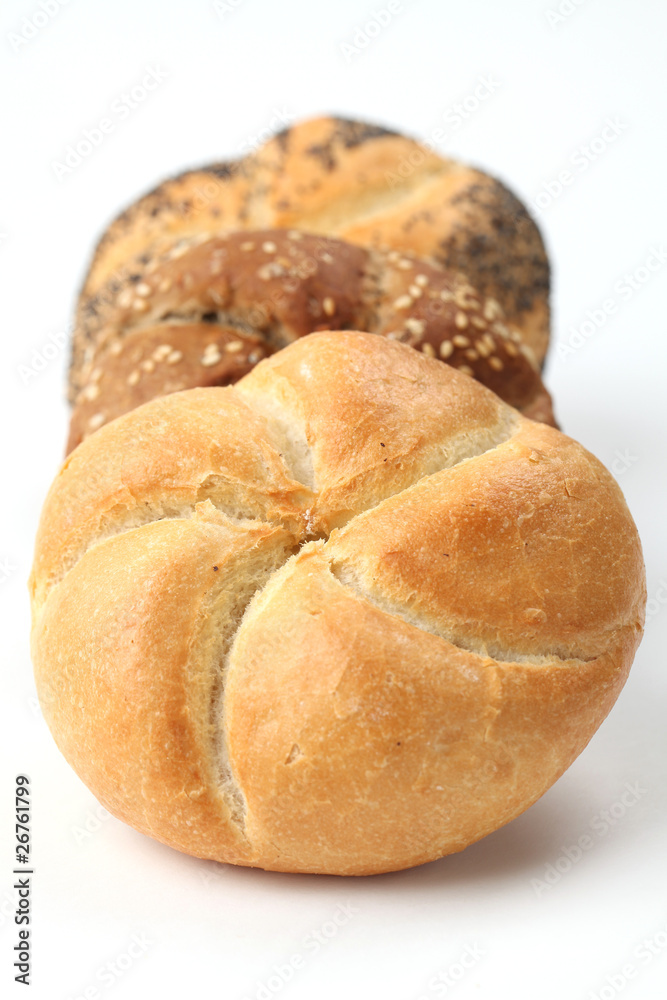 Three different buns on white background. Shallow dof