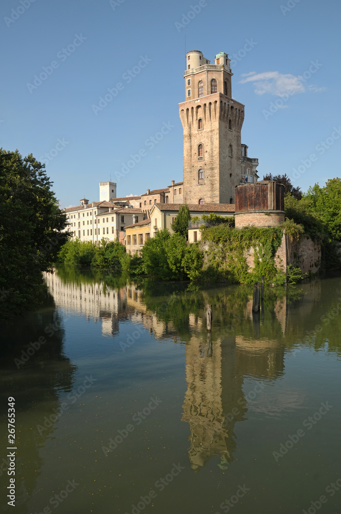 Padua, Italy. Old castle tower named 'Specola' along river