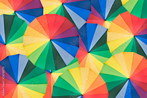 Umbrella with rainbow colors as background