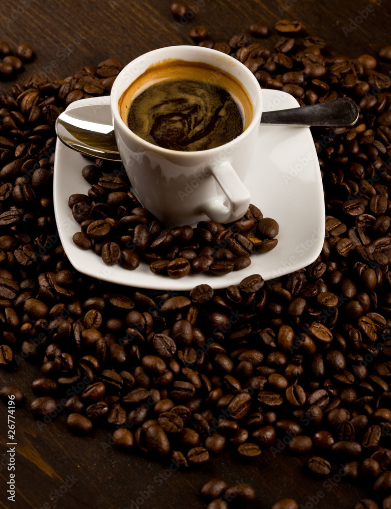 Fototapeta premium Tazzina con chicchi di caffè