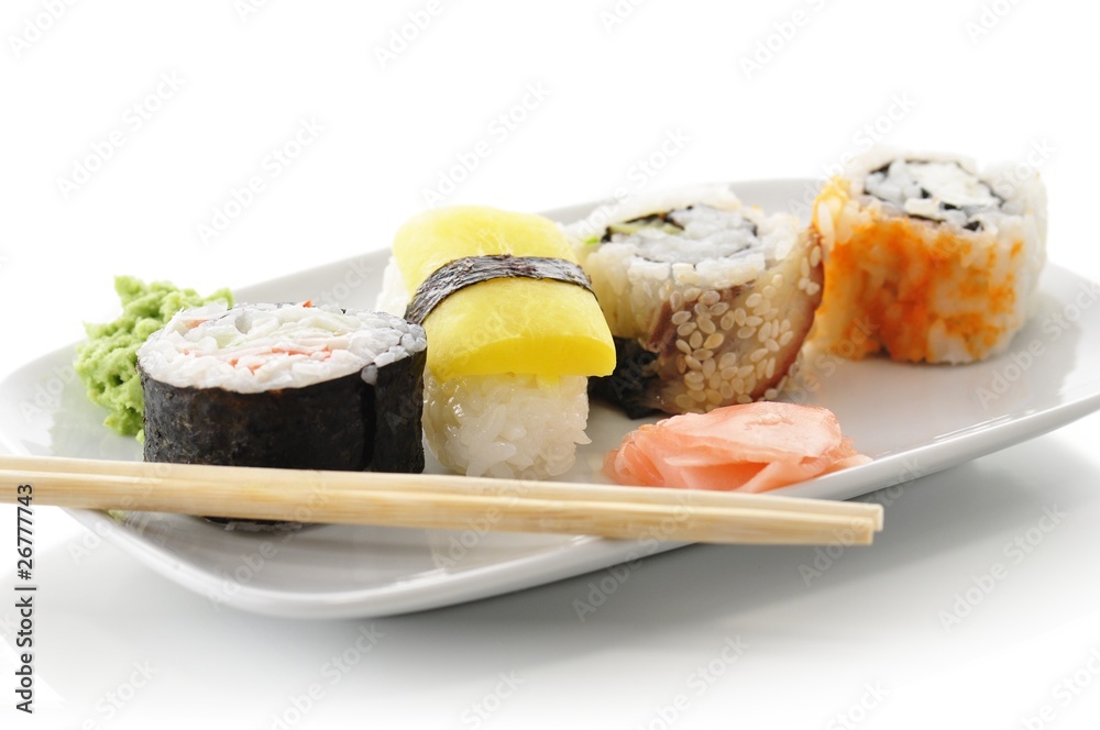 sushi on a white dish sushi on a white dish