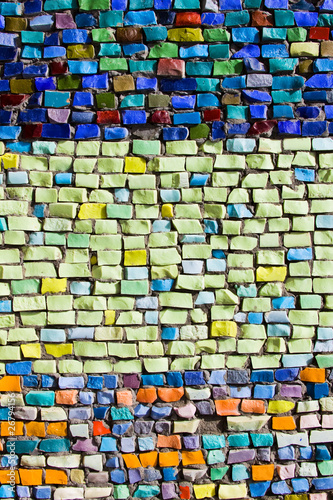 Vertical colorful mosaic texture on wall