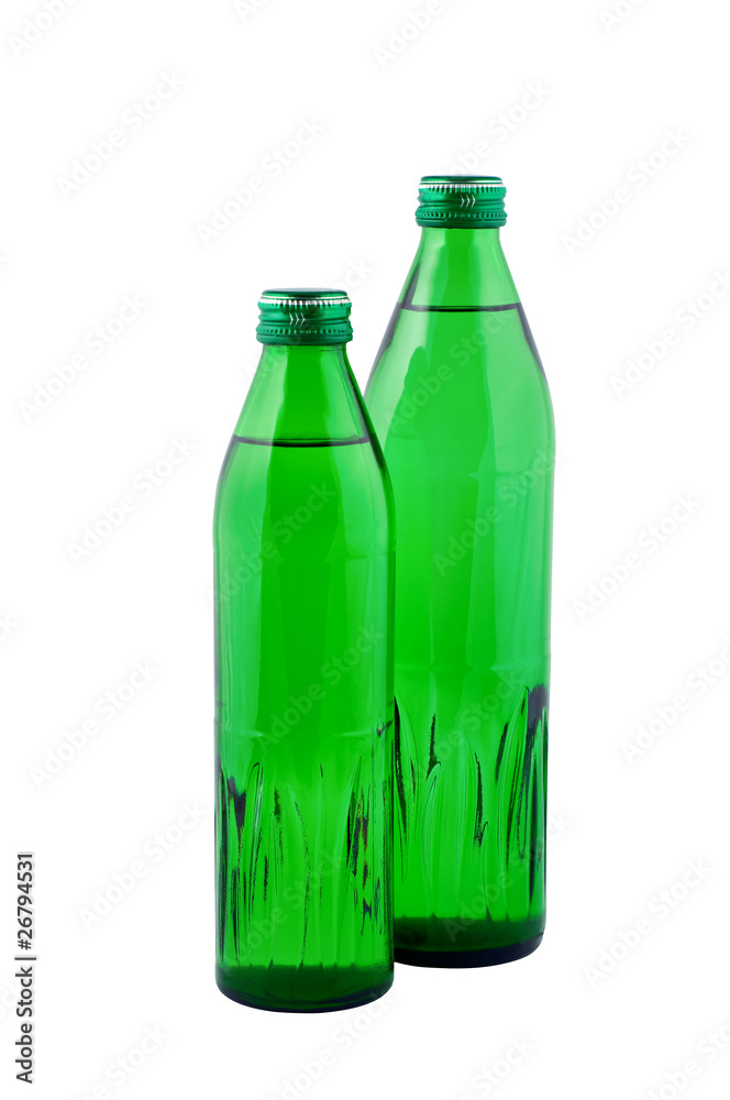 Water in bottles isolated on white. Water in bottles isolated on white.