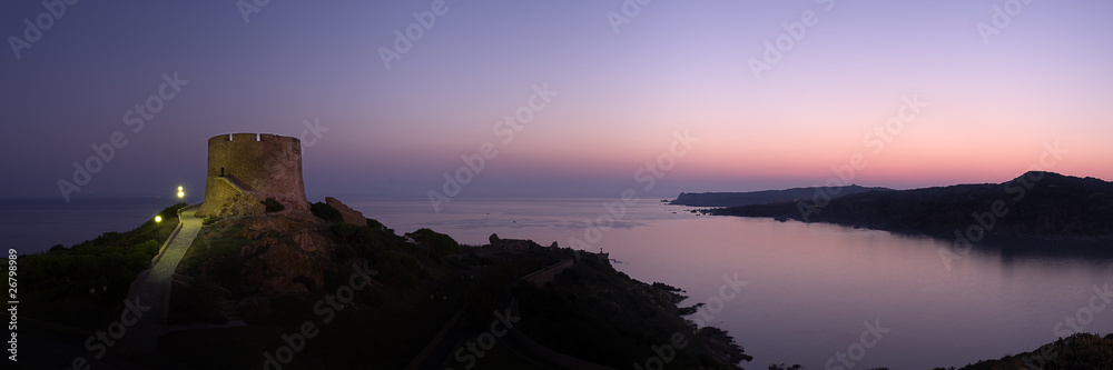 Panoramic view at dawn of coastline whit old ruins