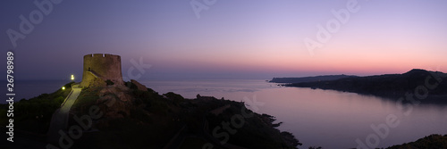 Panoramic view at dawn of coastline whit old ruins