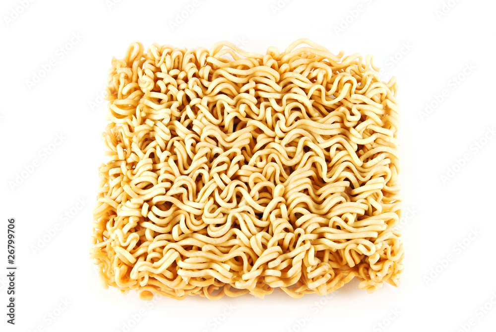 A block of Instant noodles isolated on white background A block of Instant noodles isolated on white background