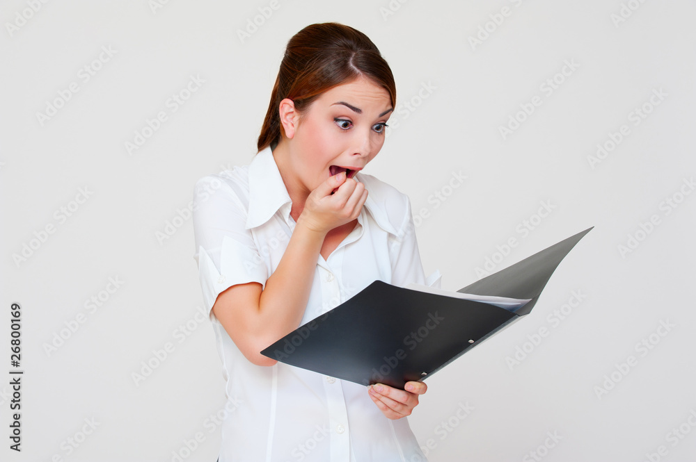 amazed woman with her report amazed woman with her report
