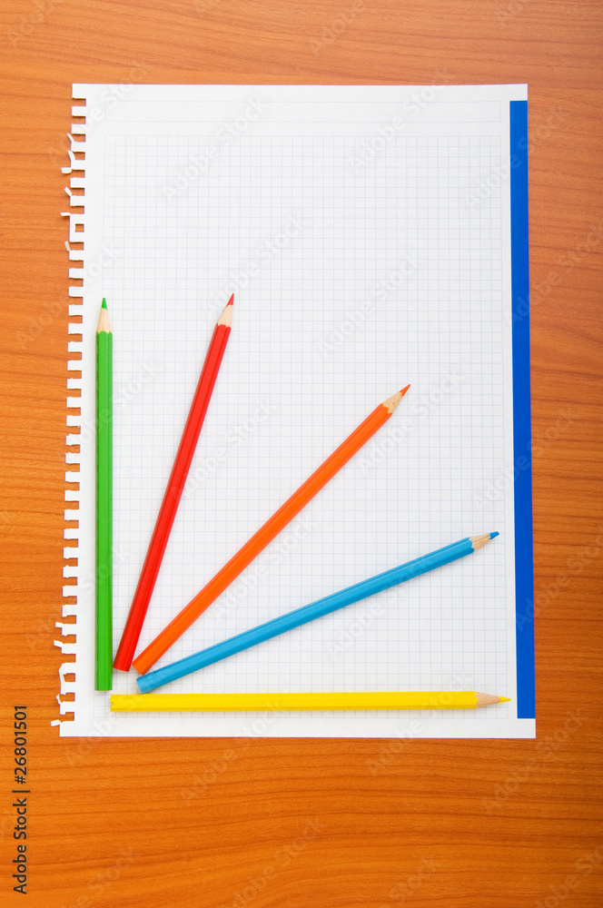 Binder and pencils isolated on the background Binder and pencils isolated on the background
