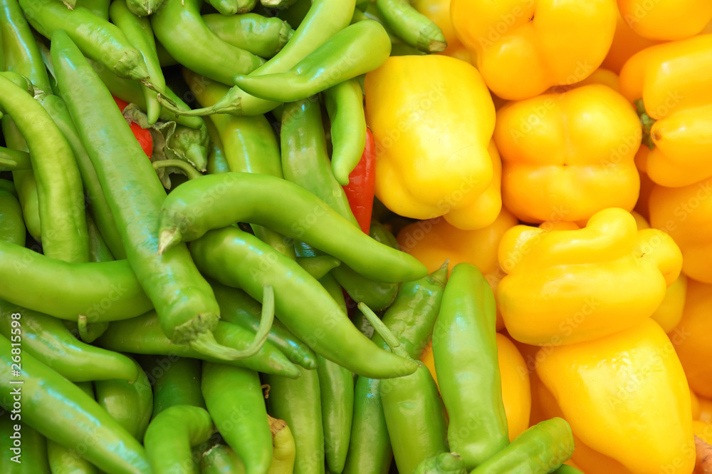 close up of yellow and green peppers