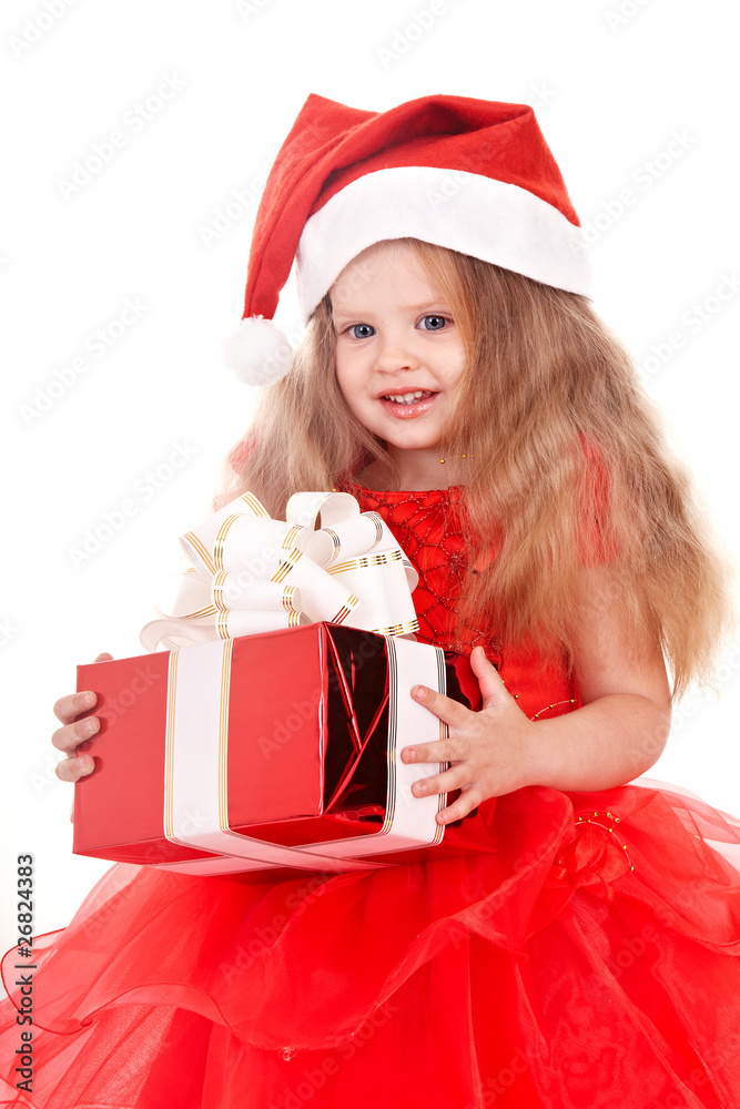 Child in red santa hat holding gift box. Isolated. Child in red santa hat holding gift box. Isolated.