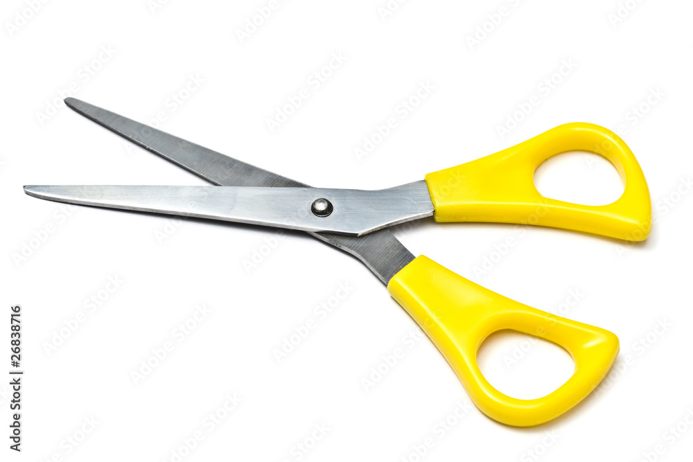 Yellow andled scissors isolated on a white Yellow andled scissors isolated on a white