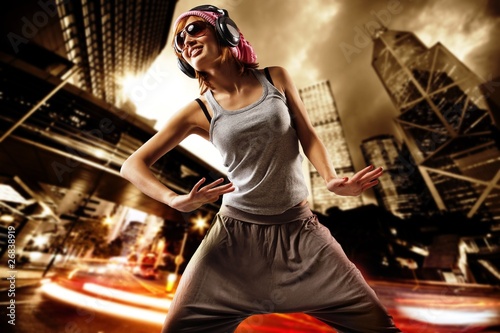 Картината върху платно Beautiful dancing girl on a street