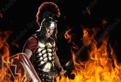 Angry legionary soldier in the fire photo