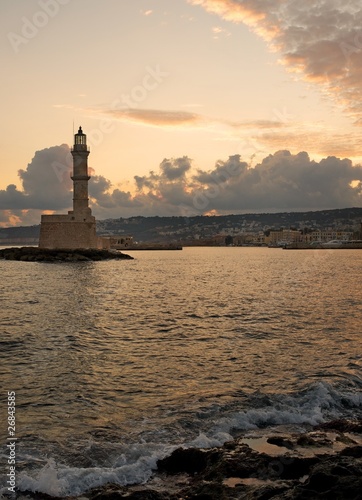 Lighthouse against cloudy sky © Nejron Photo