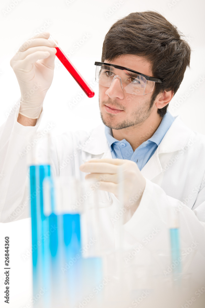 Flu virus experiment - scientist in laboratory Flu virus experiment - scientist in laboratory