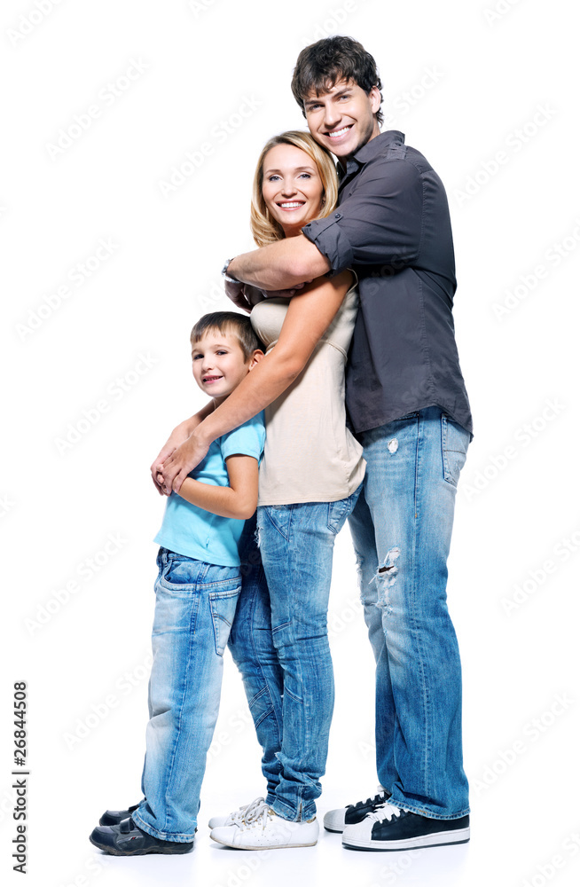 Full portrait of happy family with child standing on white Full portrait of happy family with child standing on white