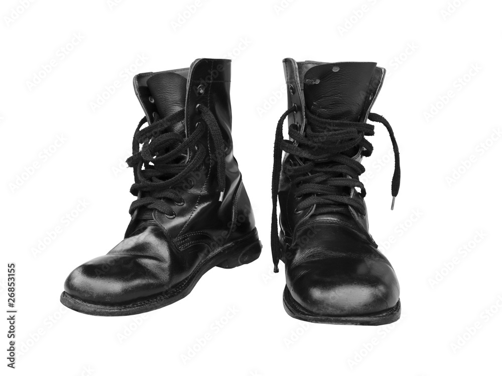 old black combat shoes isolated on white