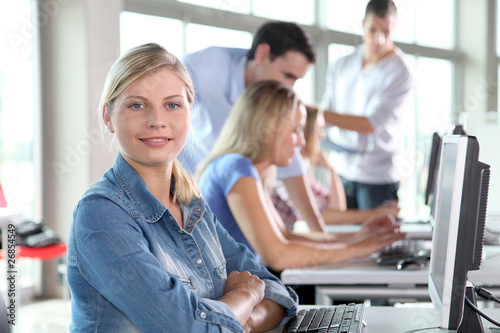 Closeup of blond woman attending training course
