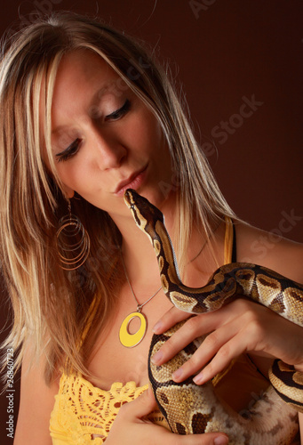 woman holding a snake