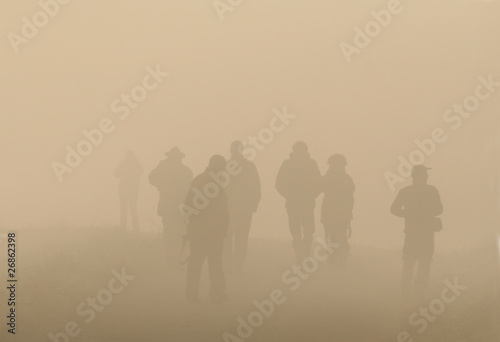 silhouettes in fog © Budimir Jevtic