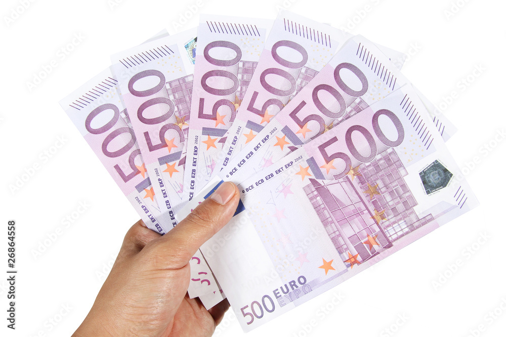 Hand holding 500 euro bills Hand holding 500 euro bills