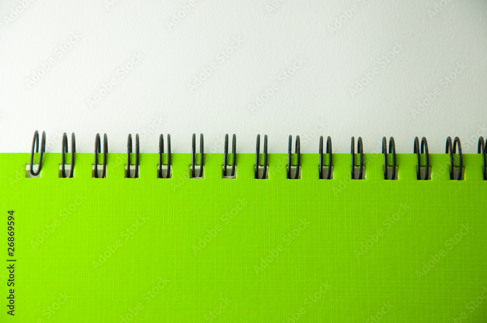 isolated green notebook on white. isolated green notebook on white.