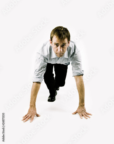 Businessman in sprint position