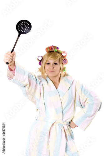 funny housewife with curlers and skimmer