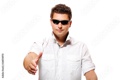 Young businessman shaking hands