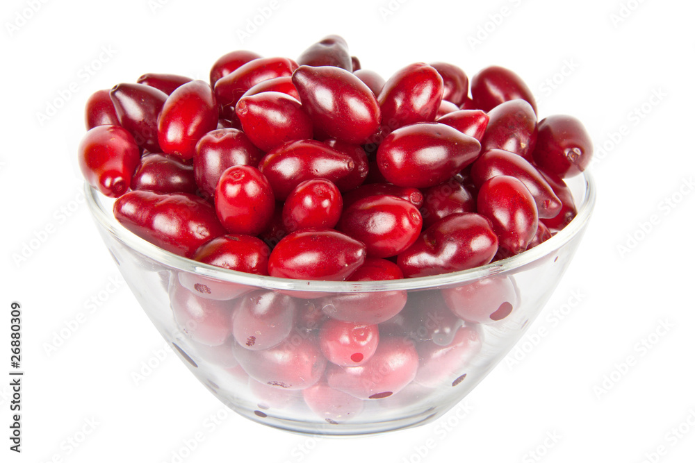 glass bowl with ripe Cornelian cherries glass bowl with ripe Cornelian cherries