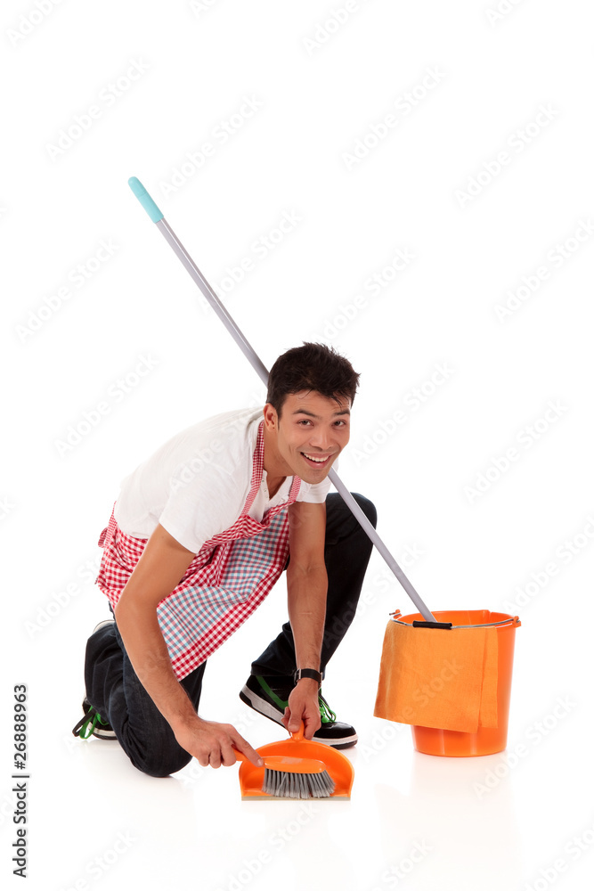 Smiling young Nepalese man, housework Smiling young Nepalese man, housework