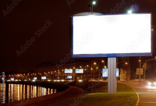 The big white bill-board on night quay