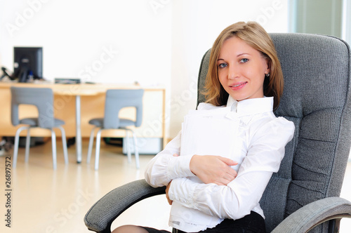 young girl in his office © Sergey Nivens