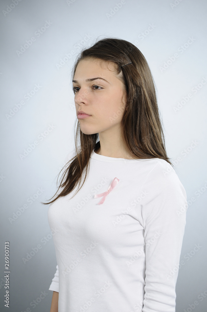 woman showing pink symbol against breast cancer woman showing pink symbol against breast cancer