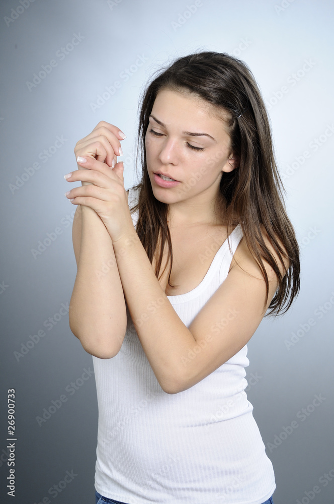 white girl refreshing her body with moisturizer white girl refreshing her body with moisturizer