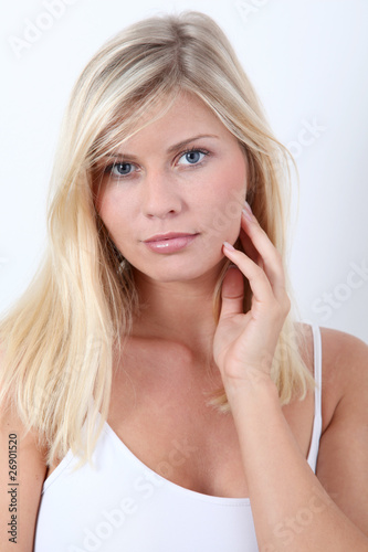 Beautiful blond woman on white background